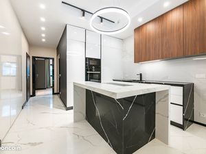 Duplex familial d’exception avec grand jardin privatif