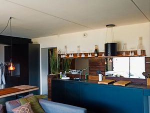 À la location : appartement en rez-de-jardin d'une maison contemporaine avec vue paradisia