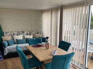 T2 meublé 40 m² + véranda 20 m² – Quartier Parc des Poètes – Garage + cave