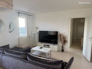 Dans un ecrin de verdure tres bel appartement type 2