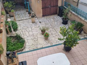 Maison chaleureuse 90.92m²  2 chambres + 1 bureau  agréable jardinet