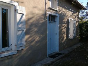 Maison plain-pied avec jardin