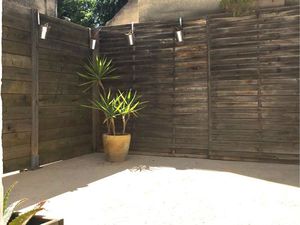 T2 spacieux sécurisé avec bel extérieur