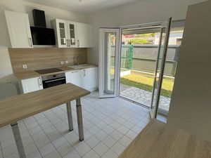 Logement 3 chambres  garage et jardin