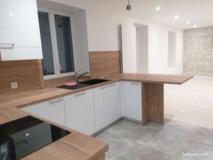 F3 rénové avec petit jardin et terrasses dans maison ancienne