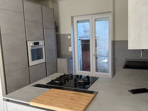 Maison plateau avec cour et garage