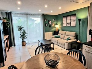 Maison individuelle avec garage et jardin