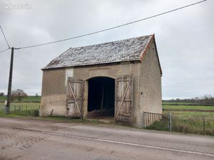 Bâtiment avec terrain