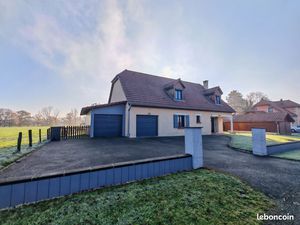 Maison individuelle avec jardin et garages