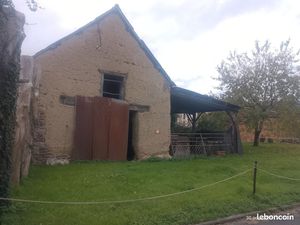 Terrain à batir avec une grange en terre de 40m² au sol habitable