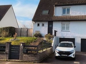 Maison familiale lumineuse avec jardin – garage et sous-sol complet – quartier calme