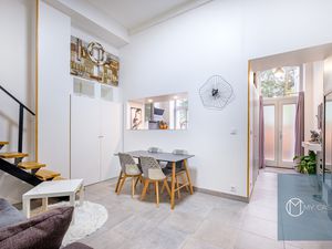 Appartement rénové en rez de jardin au coeur d'une chapelle