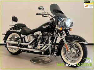HARLEY-DAVIDSON SOFTAIL 96 FLSTN DELUXE | UNIEK EXEMPLAAR MET HEEL VEEL AC