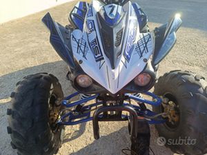 QUAD 125