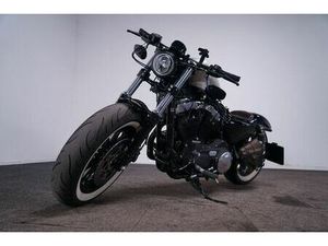 OTHER FORTY-EIGHT SPORTSTER MILLER EXHAUST/LEDERTASCHE