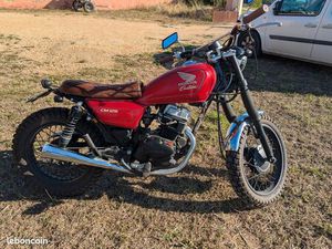 HONDA CM 125 CC STYLE SCRAMBLER.■DÉMARRE AU QUART DE RETOUR. ENTRETIEN ET VIDANGE FAITE RÉGULIÈREMENT. ■JE M'EN SÉPARE AVEC REGRETS..