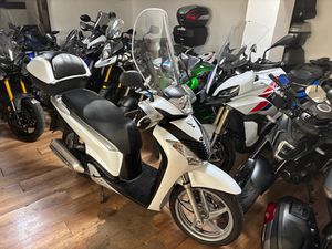 HONDA SH 150 →