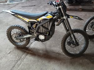 SURRON ULTRA BEE →