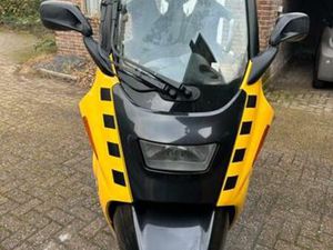 BMW C1 EXECUTIVE - GEEL ZWART MET KOFFER RIJDEN ZONDER HELM! — MOTOREN | BMW — MARKTPLAATS