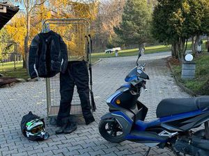 FAHRSCHULE ERSTAUSRÜSTUNG MIT ROLLER