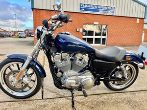 HARLEY-DAVIDSON SUPERLOW XL 883 L 13 IN REAL GOOD CONDITION.( ONLY 531 MILES )
