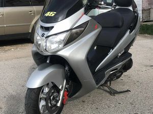 SUZUKI BURGMAN 400I →