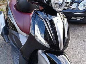 PIAGGIO BEVERLY M69 →