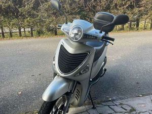 125 CCM