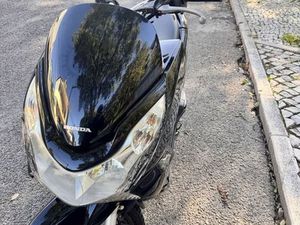 I WANT TO SELL MY HONDA PC 125 BLACK COLOUR ……………………………………………………………….. SÃO DOMINGOS DE RANA