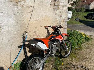 ÉCHANGE 85 SX CONTRE VOITURE