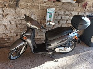 SCOOTER KIMCO PEOPLE