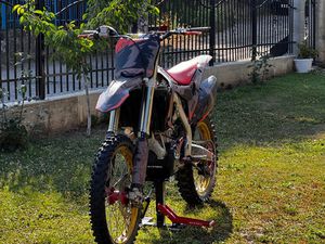 HONDA CRF →