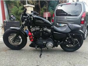 FORTY-EIGHT HARLEY DAVIDSON