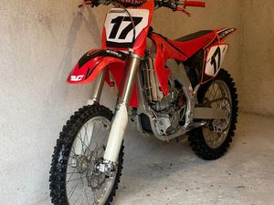 HONDA CRF →