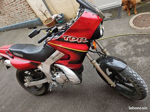 125 TDR ÉCHANGE CONTRE 125 RDX