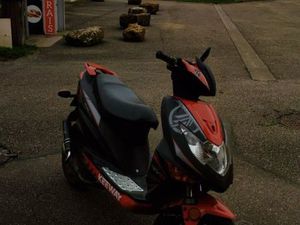 ÉCHANGE D'UN SCOOTER CONTRE UNE MOTO 50 CC