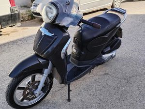 APRILIA SCARABEO 125 А1 →