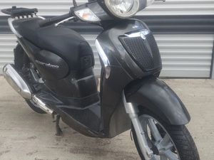 APRILIA SCARABEO 200 →