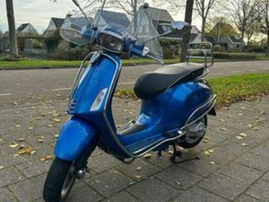 VESPRA SPRINT BLAUW 2015, 11158 KM — SCOOTERS | VESPA — MARKTPLAATS