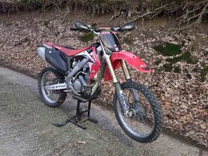 HONDA CRF →