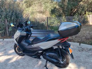 FORZA 125 OU ÉCHANGE