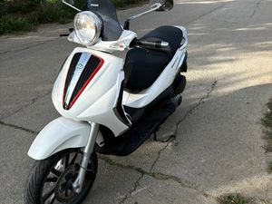 PIAGGIO BEVERLY →