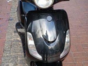 MOTOCICLETA SCOOTER ENCOSTA DO SOL