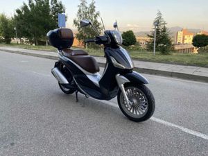 PIAGGIO BEVERLY BEVERLY →