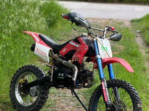 КРОС 125 CC →