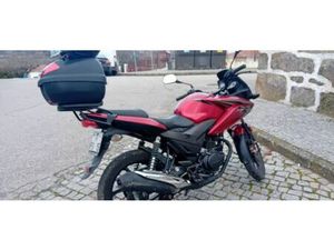 VENDA MOTA HONDA 125 CC EM PERFEITO ESTADO DE CONSERVAÇÃO ÚNICO DONO LEBUÇÃO, FIÃES E NOZELOS