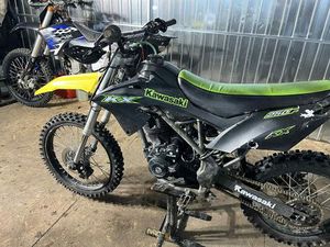 CROSS DEFENDER 250 KSIĄŻNICZKI