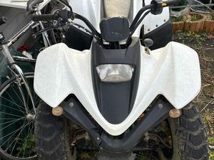 QUAD 125