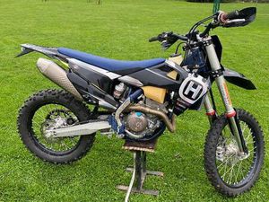 ② HUQSVARNA FE 250