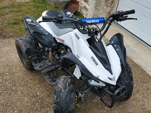 QUAD 125
